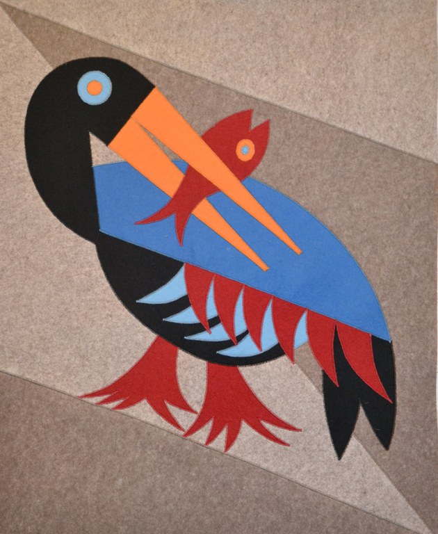 Pellicano con pesce T24008